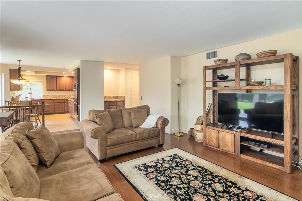 2887 Queens Way Thousand Oaks, CA 91362 - Photo 12 of 35 a living room with furniture and a flat screen tv
