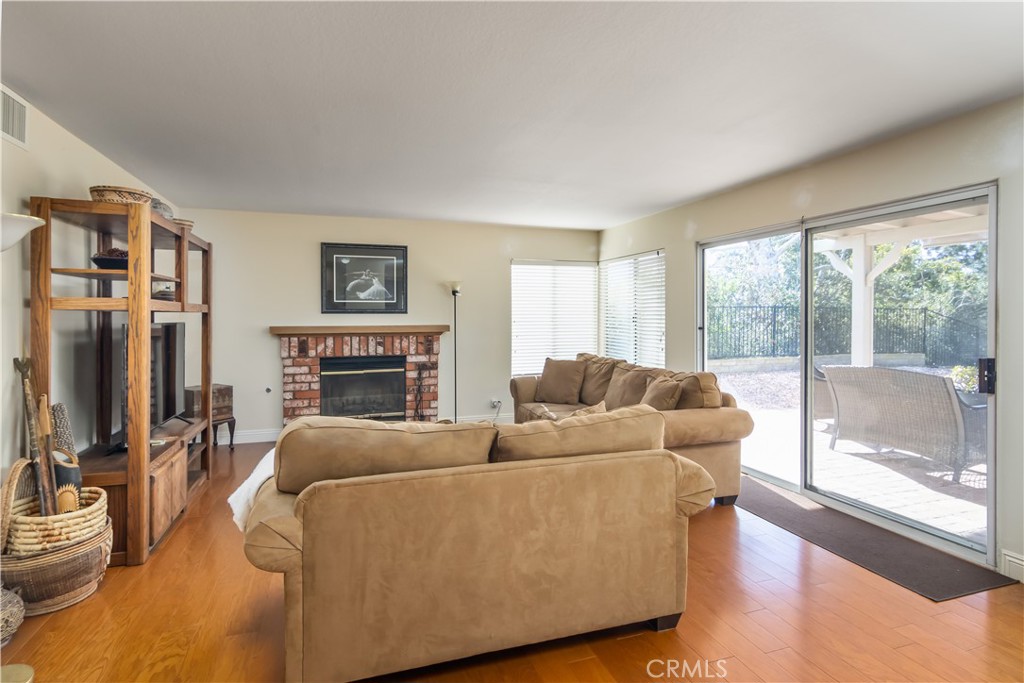 2887 Queens Way Thousand Oaks, CA 91362 - Photo 13 of 35 a living room with furniture and a fireplace
