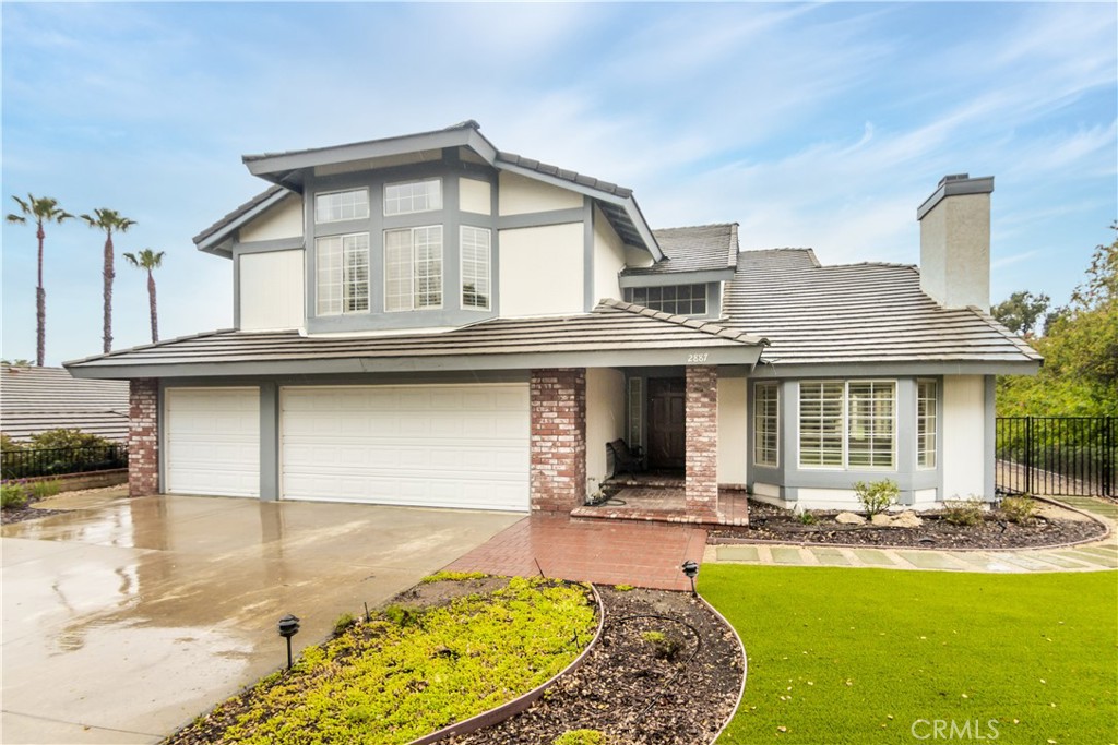 2887 Queens Way Thousand Oaks, CA 91362 - Photo 2 of 35 a front view of a house with swimming pool