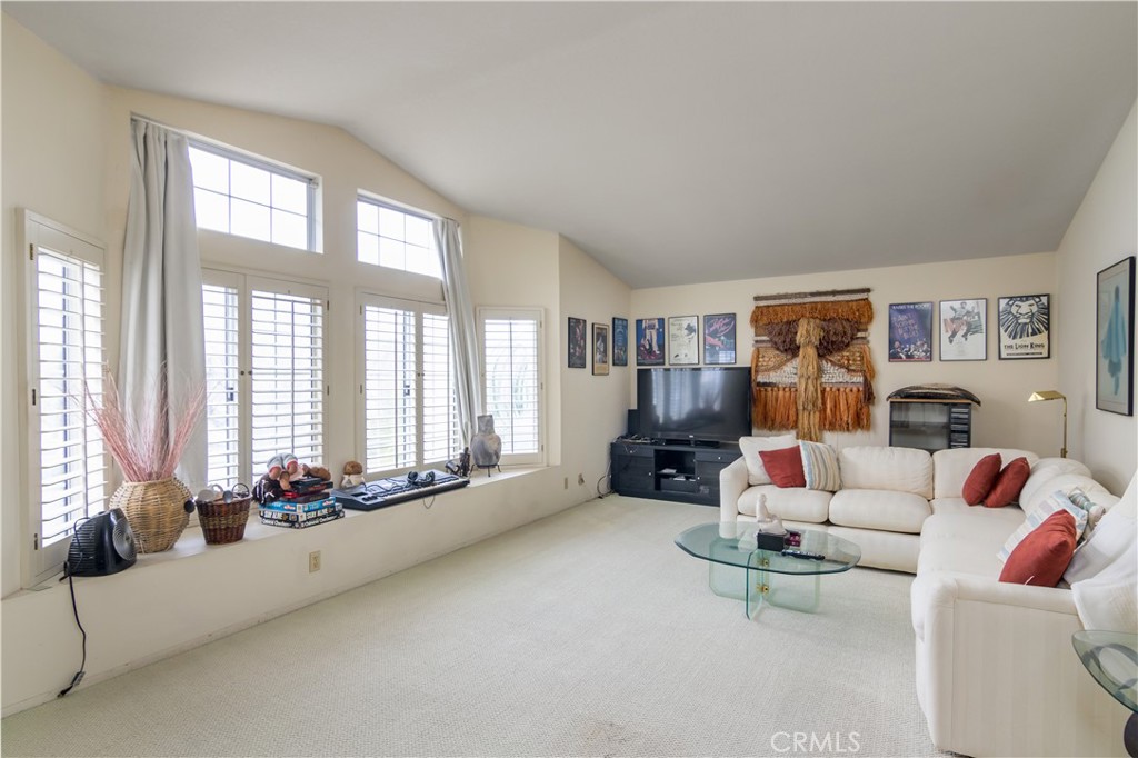2887 Queens Way Thousand Oaks, CA 91362 - Photo 21 of 35 a living room with furniture and large windows