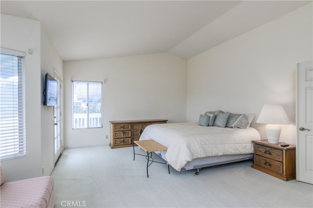 2887 Queens Way Thousand Oaks, CA 91362 - Photo 23 of 35 a bedroom with a bed and window