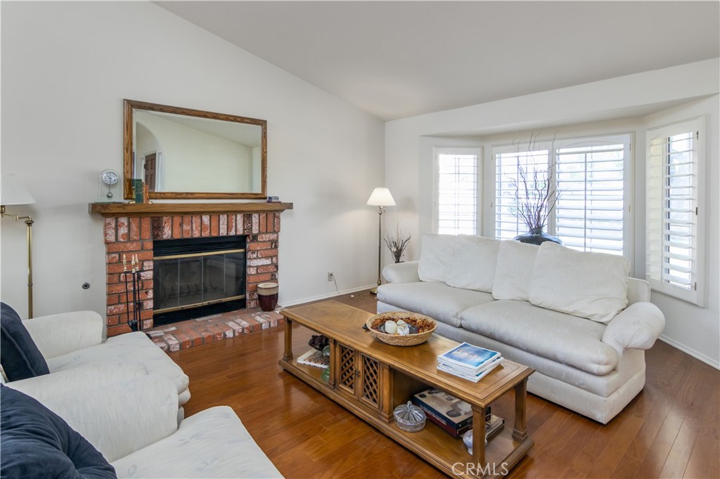 2887 Queens Way Thousand Oaks, CA 91362 - Photo 6 of 35 a living room with furniture and a fireplace