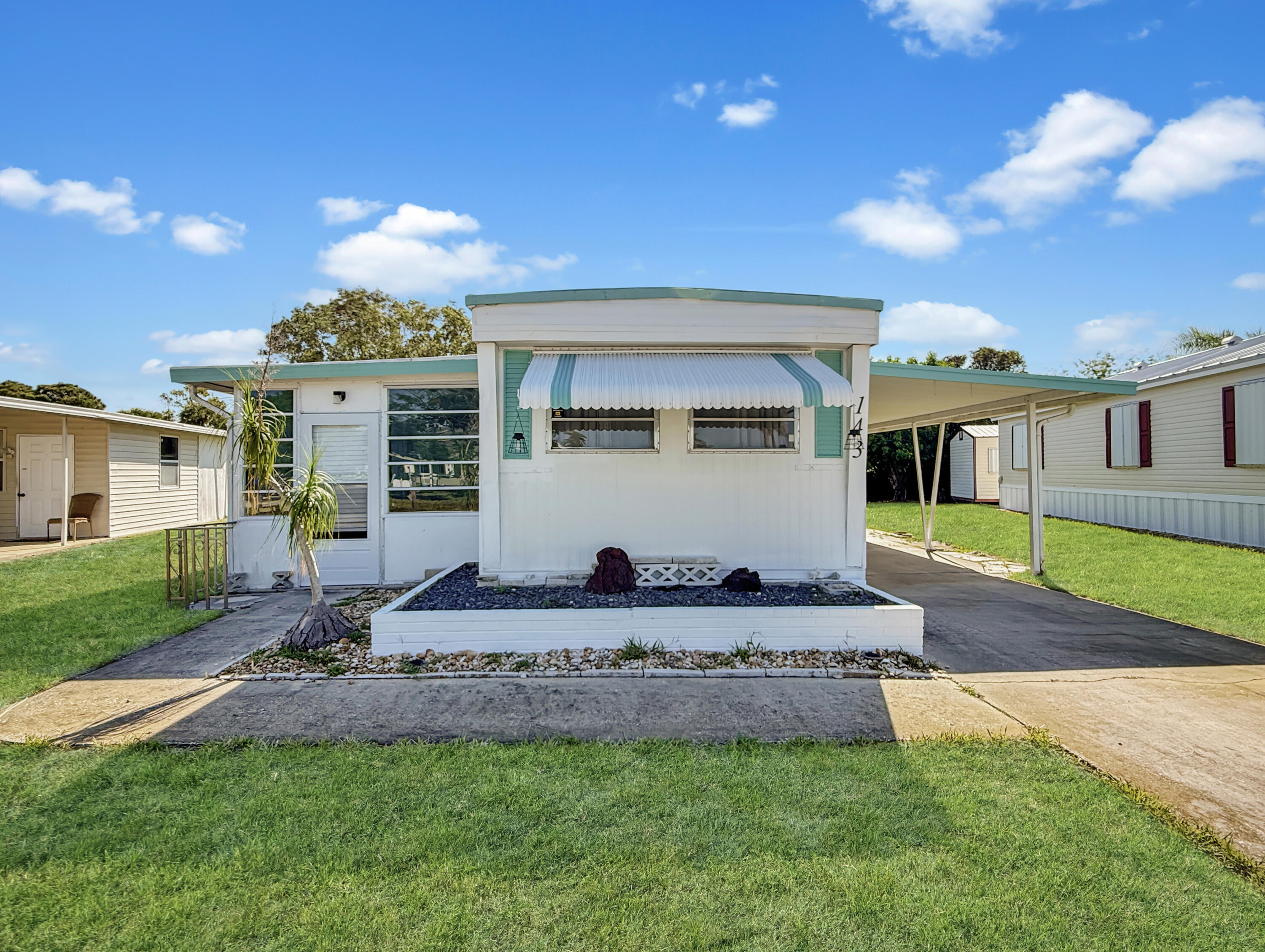 143 Southeast Easy Street Stuart, FL 34994 - Photo 1 of 25 b123a22d9ef7b5b150fe0b6cd5dd989cf7bcd27f