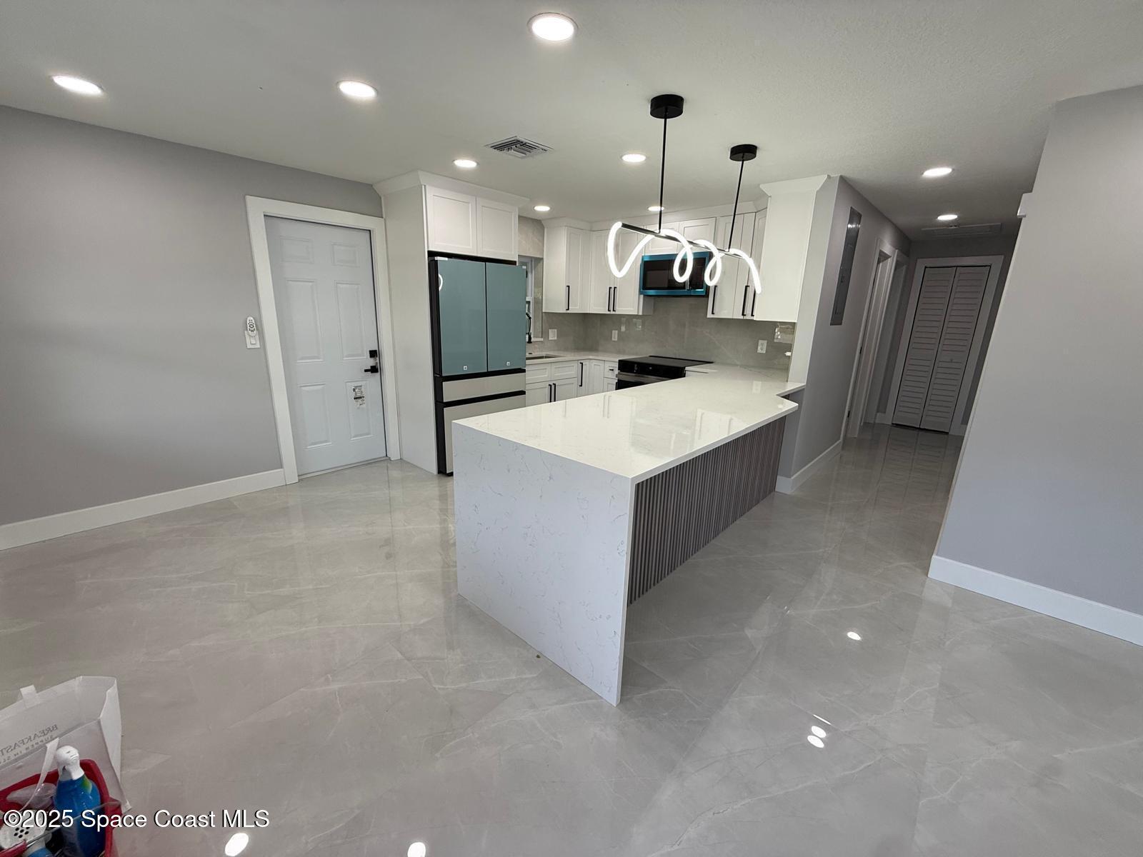2374 Post Road Melbourne, FL 32935 - Photo 8 of 23 PHOTO-2025-07-08-08-27-49-9