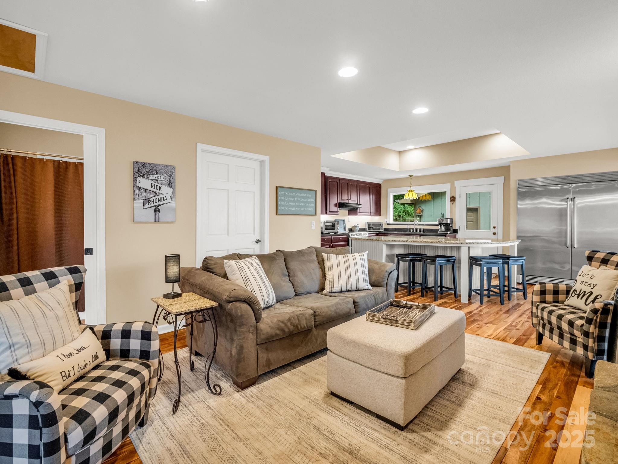 315 Thomas A Edison Rd Lake Lake Lure, NC 28746 - Photo 23 of 47 a living room with furniture and a view of kitchen