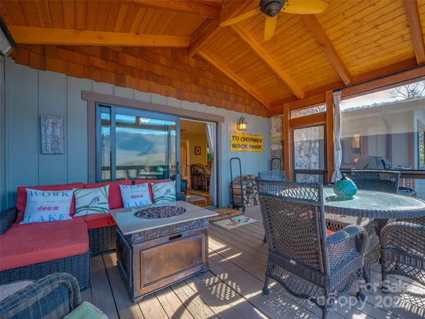 a outdoor living space with furniture and a potted plant