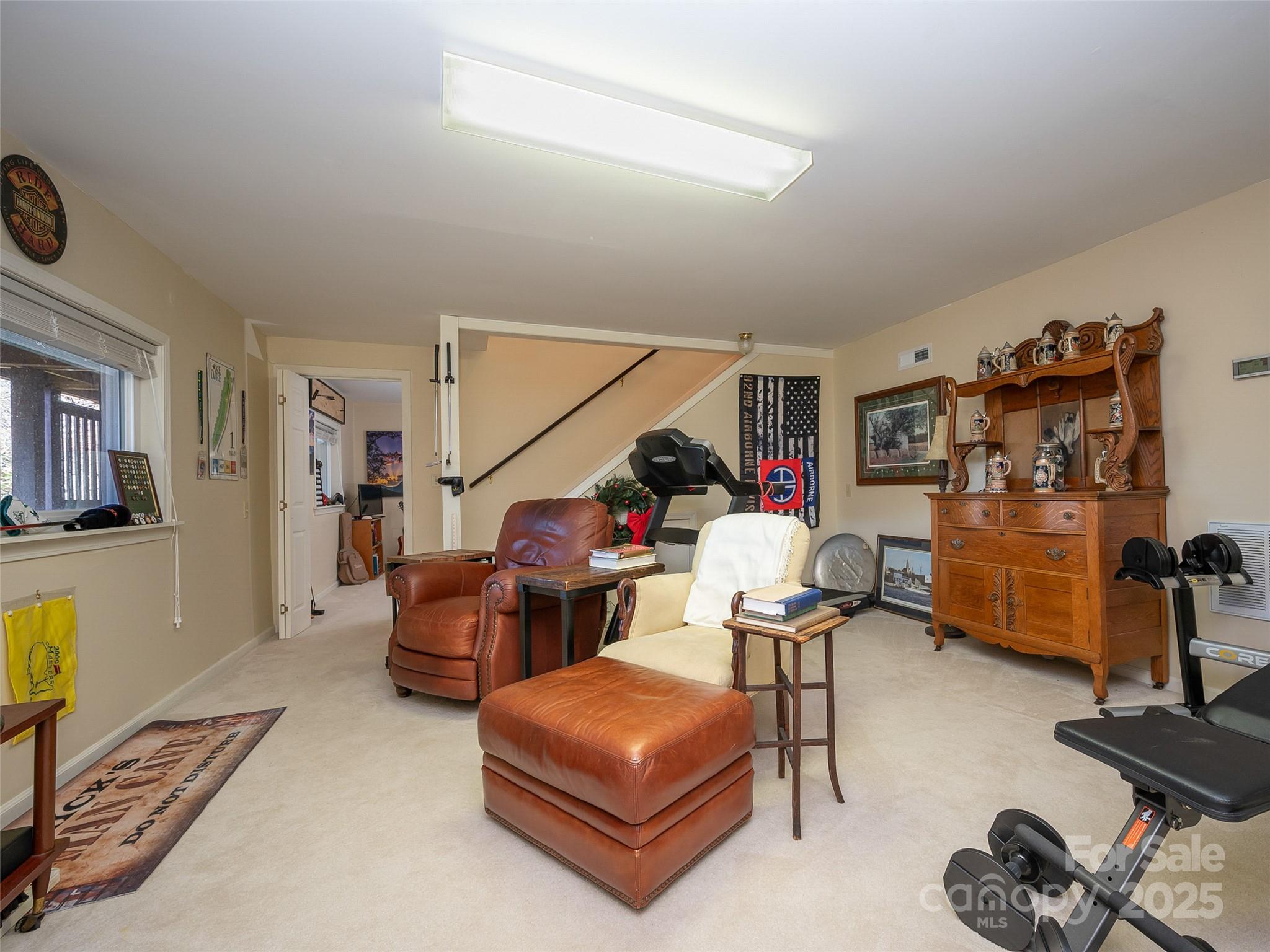 315 Thomas A Edison Rd Lake Lake Lure, NC 28746 - Photo 38 of 47 a living room with furniture and a flat screen tv