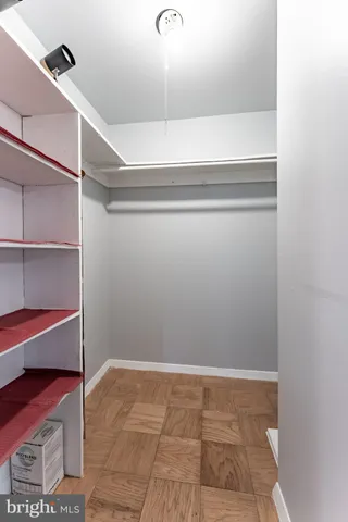 a view of an empty walk in closet