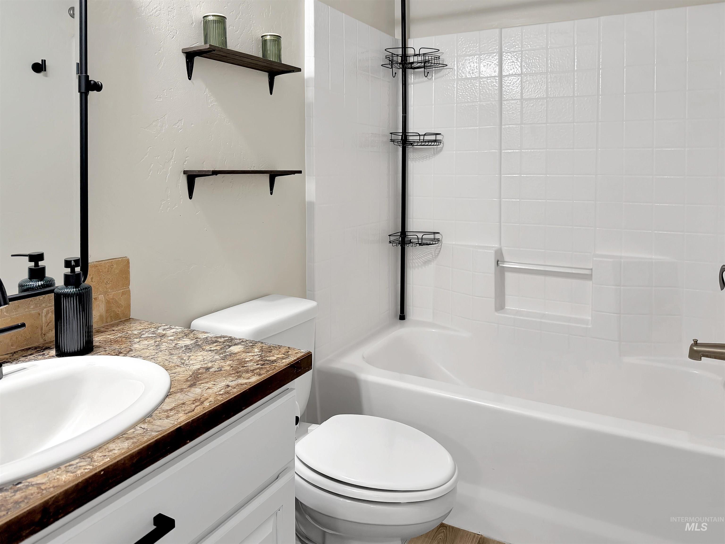2407 Forge Street Twin Falls, ID 83301 - Photo 13 of 20 Bathroom featuring vanity and shower / bath combination