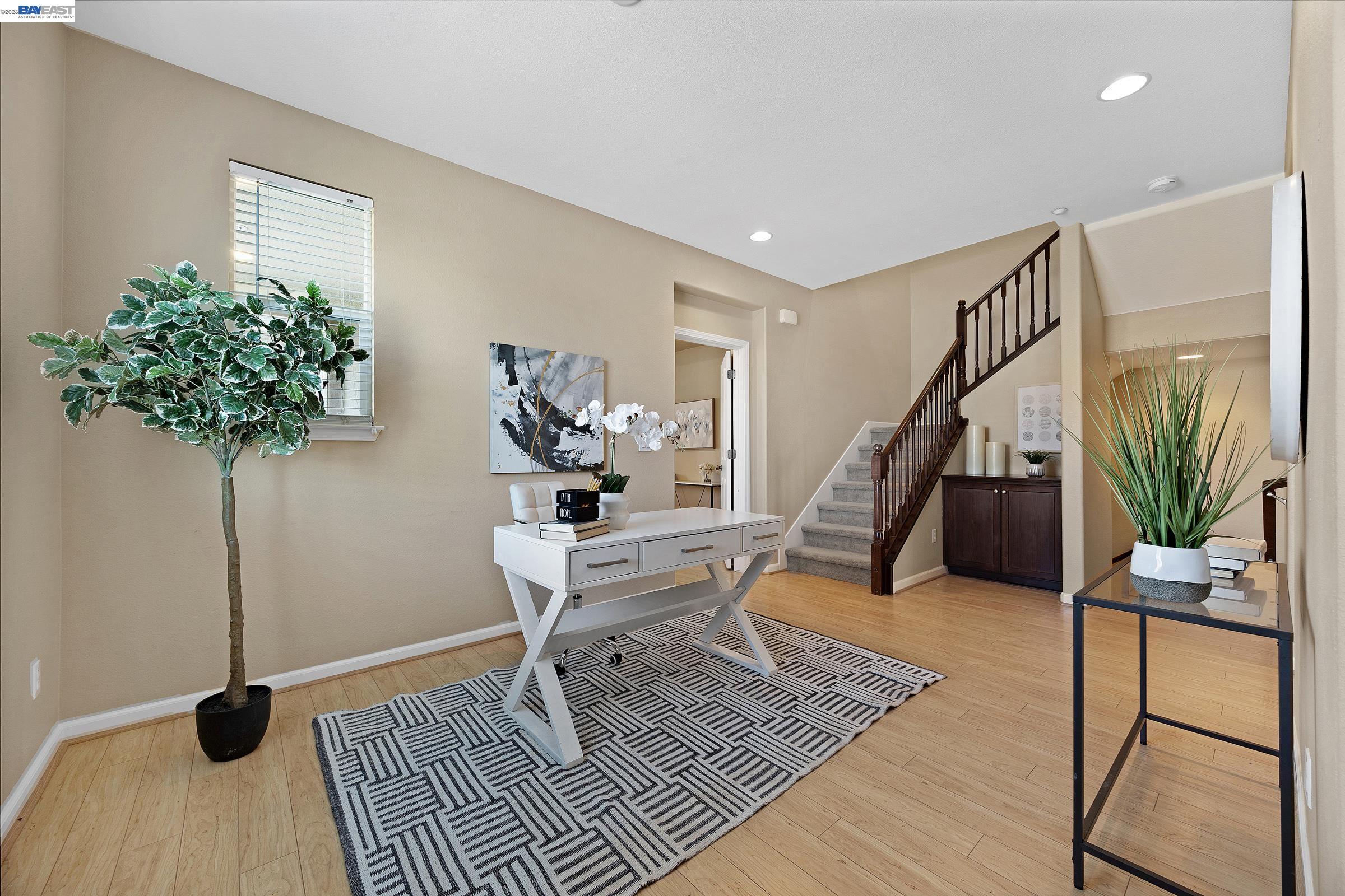 5216 Fioli Loop San Ramon, CA 94582 - Photo 20 of 41 a living room with furniture and a potted plant