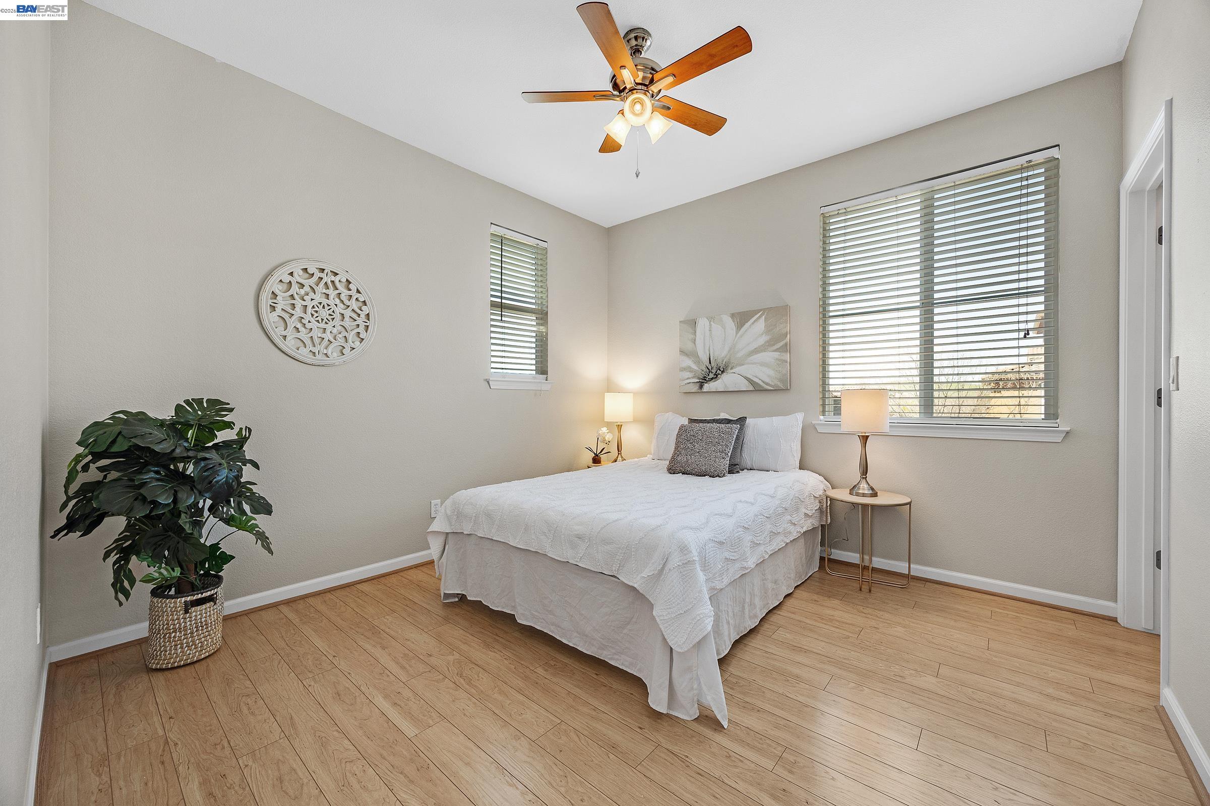 5216 Fioli Loop San Ramon, CA 94582 - Photo 21 of 41 a bedroom with a bed and a window