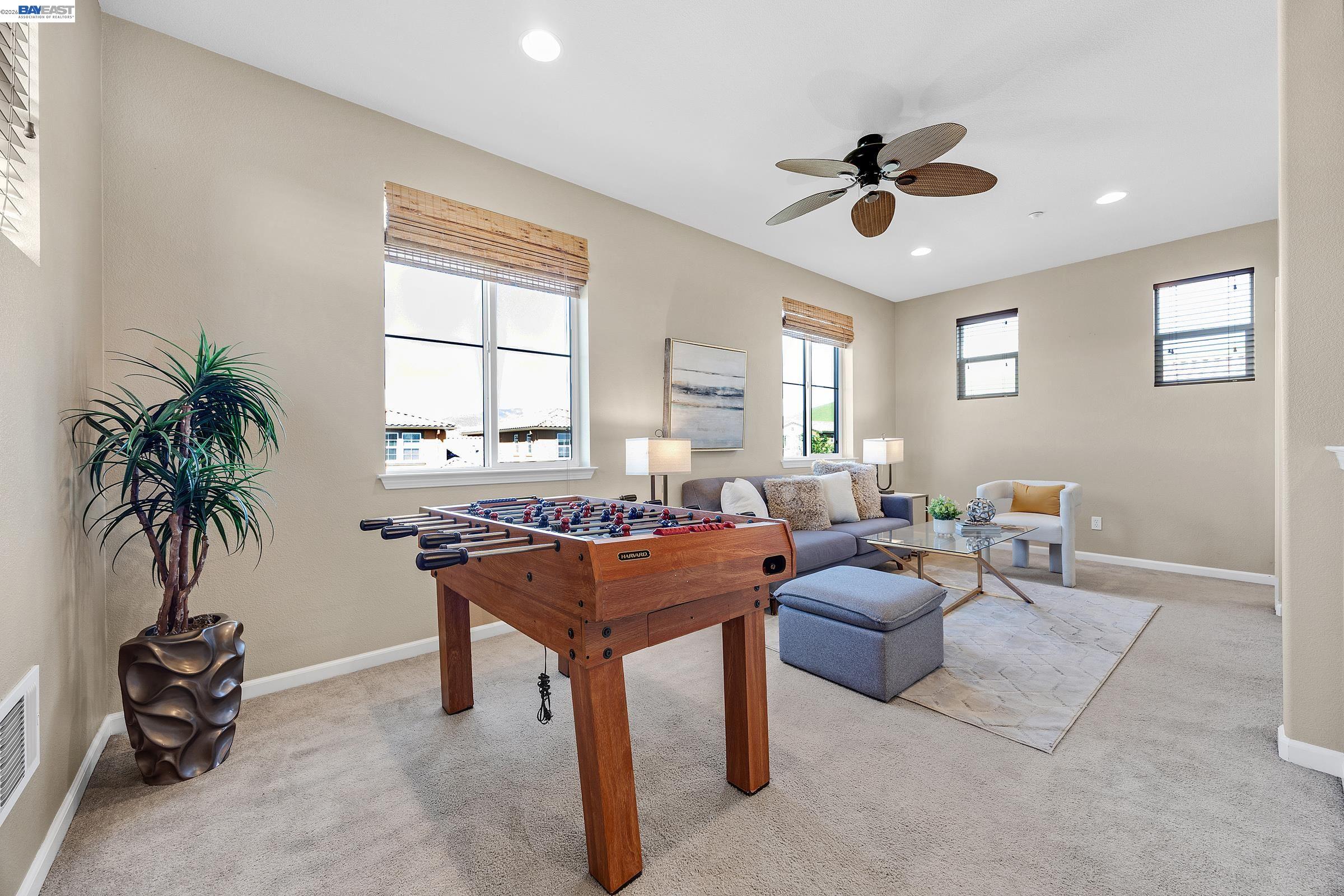 5216 Fioli Loop San Ramon, CA 94582 - Photo 27 of 41 a living room with furniture a window and a potted plant