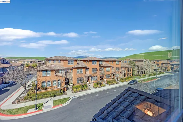 a view of a city with an ocean view