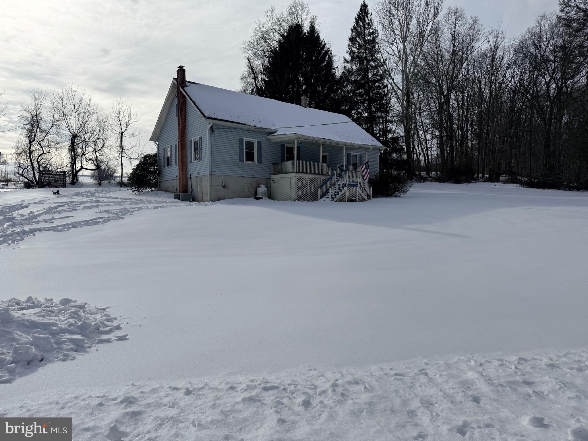 18 Booker Road Delta, PA 17314 - Photo 7 of 39 front of home with porch