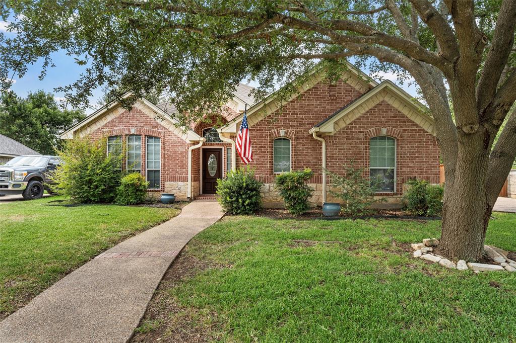 301 Canterbury Road Waco, TX 76712 - Photo 1 of 25 front view of a house with a yard
