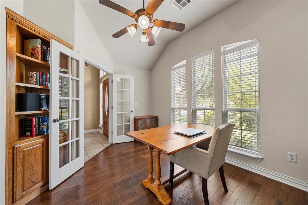 301 Canterbury Road Waco, TX 76712 - Photo 6 of 25 a view of a dining room with furniture window and wooden floor