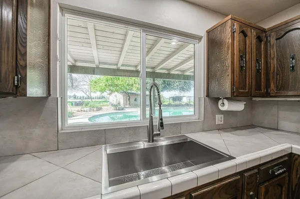 a view of a kitchen with sink