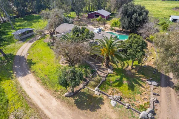 a view of an empty room with wooden walls