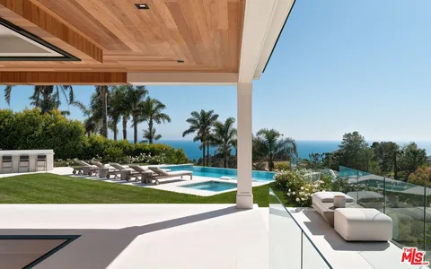 a view of a terrace with a garden