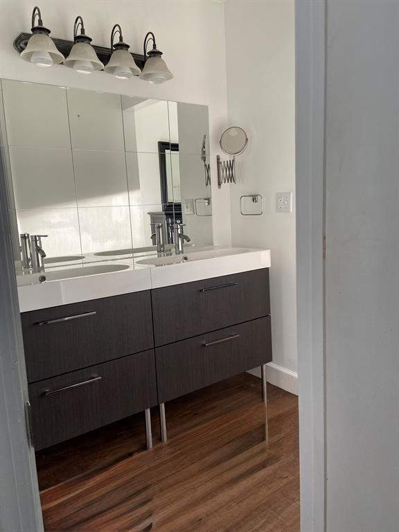 9138 Bedford Drive Boca Raton, FL 33434 - Photo 13 of 21 a bathroom with a sink and a mirror