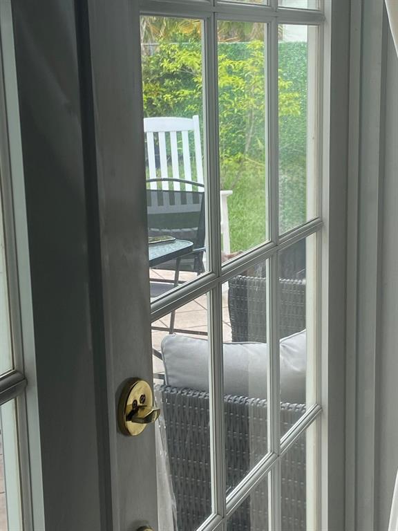 9138 Bedford Drive Boca Raton, FL 33434 - Photo 15 of 21 a view of a glass door
