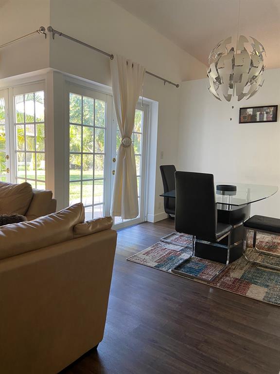 9138 Bedford Drive Boca Raton, FL 33434 - Photo 6 of 21 a living room with furniture and a window