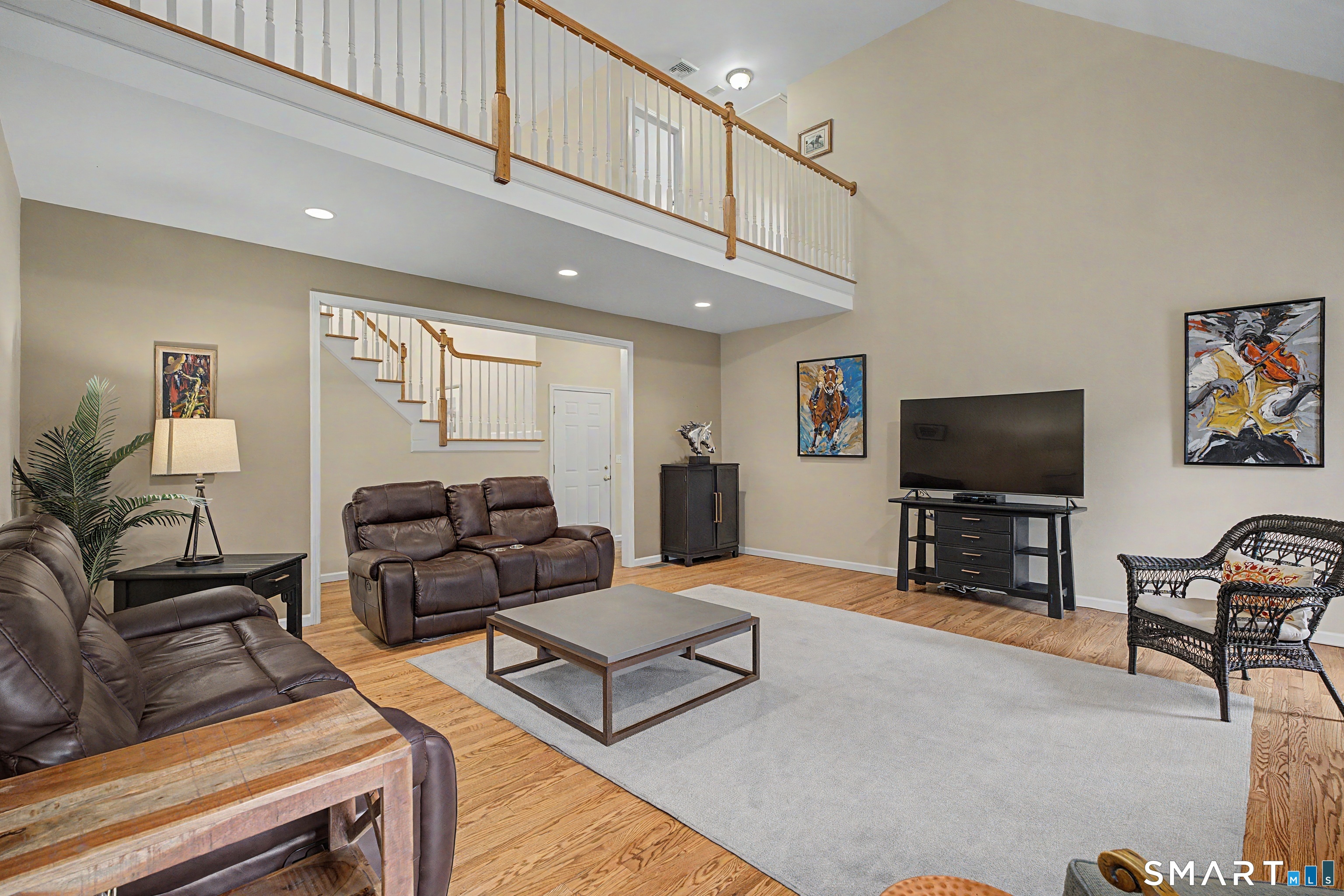 445 Dublin Road Southbury, CT 06488 - Photo 13 of 40 Cathedral ceiling family room with fireplace and opened to above