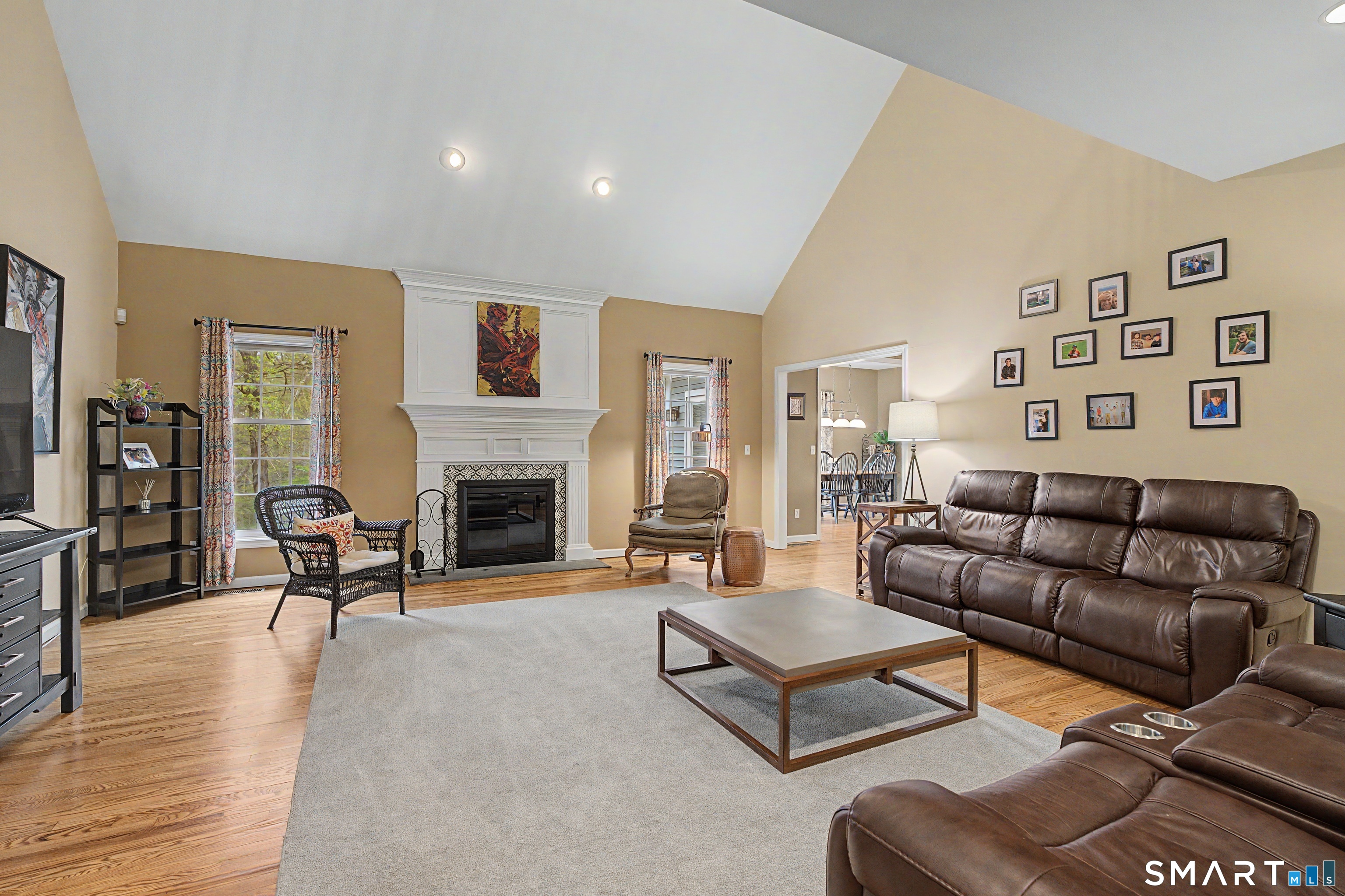 445 Dublin Road Southbury, CT 06488 - Photo 15 of 40 a living room with furniture and a fireplace