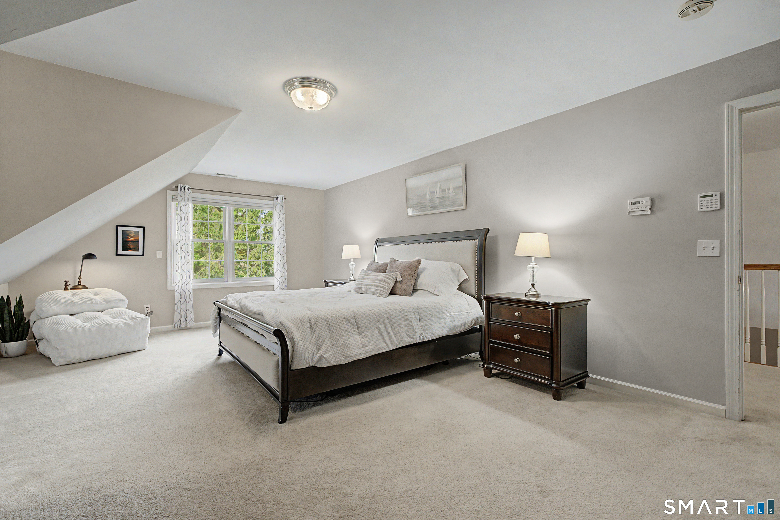 445 Dublin Road Southbury, CT 06488 - Photo 20 of 40 a bedroom with a bed and window