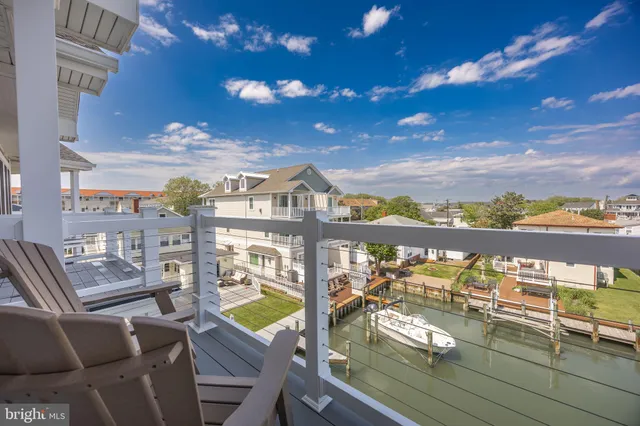 a view of a balcony with furniture