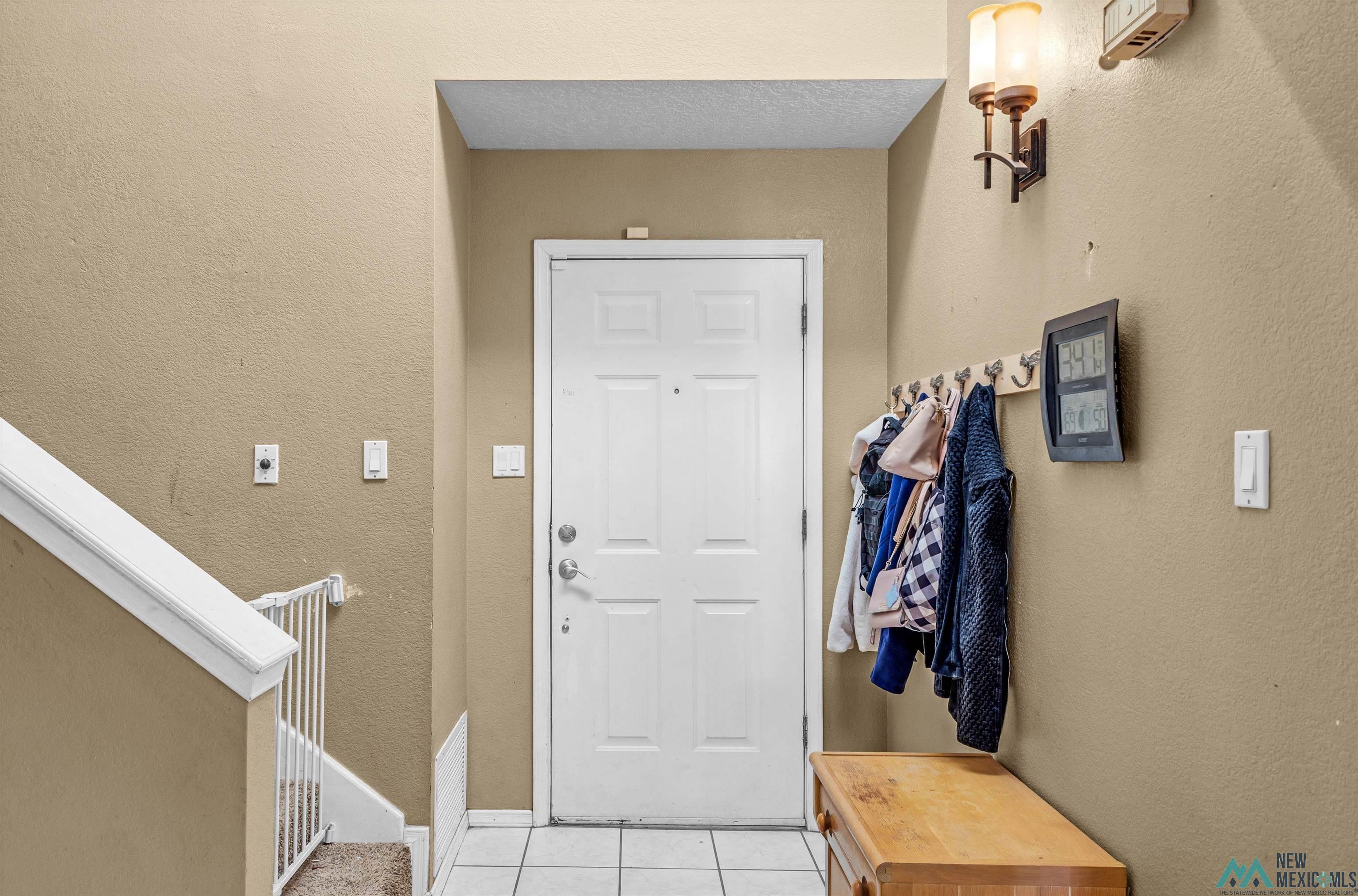 5008 Shadow Road Las Cruces, NM 88011 - Photo 12 of 35 Foyer with a textured wall and light tile patterned flooring