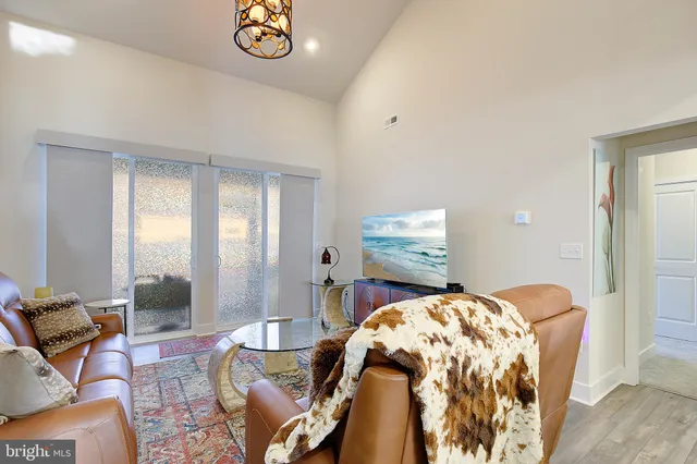 a bedroom with bed and a window