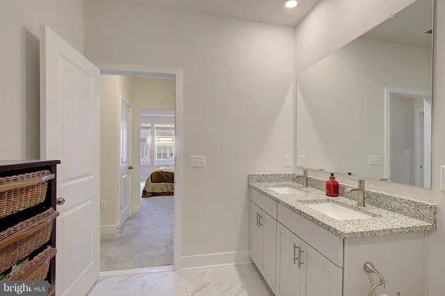 a kitchen with a sink and a stove