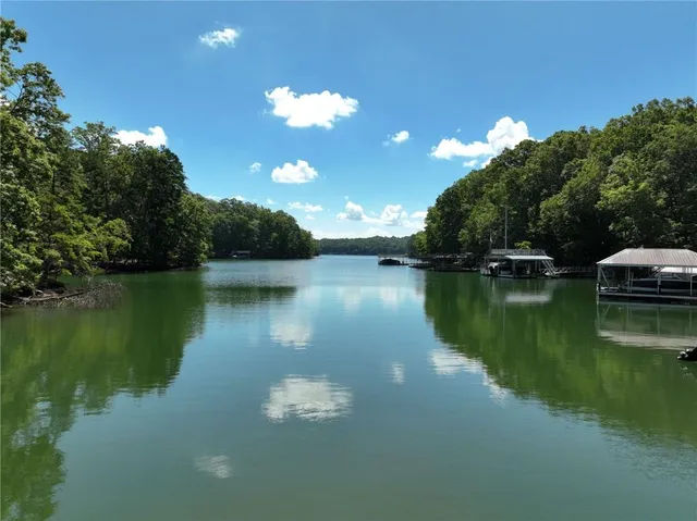 an aerial view of a golf course with parking space