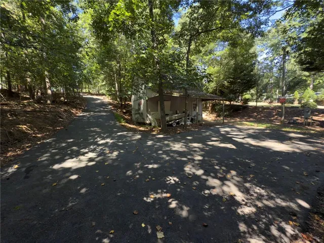 a view of a house with backyard