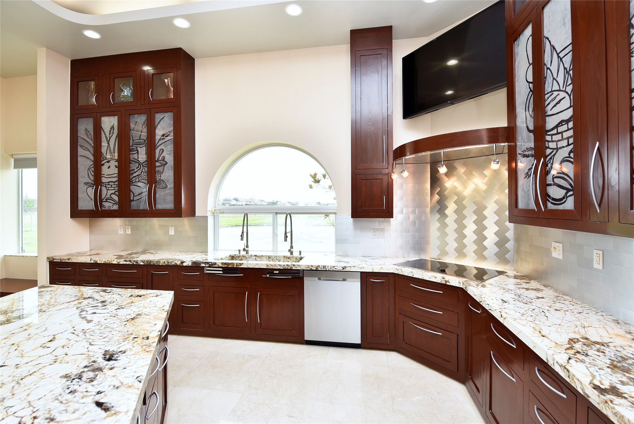 6602 Rohan Road Richmond, TX 77469 - Photo 16 of 49 a kitchen with granite countertop a sink and cabinets