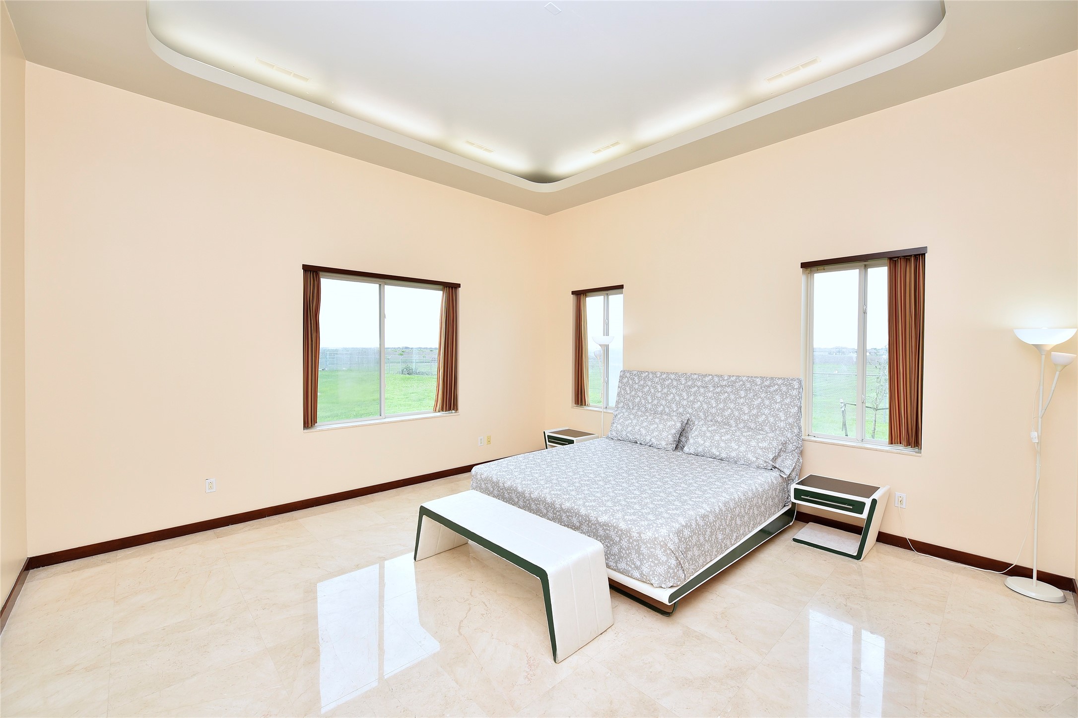 6602 Rohan Road Richmond, TX 77469 - Photo 19 of 49 a living room with a bed furniture and next to a window