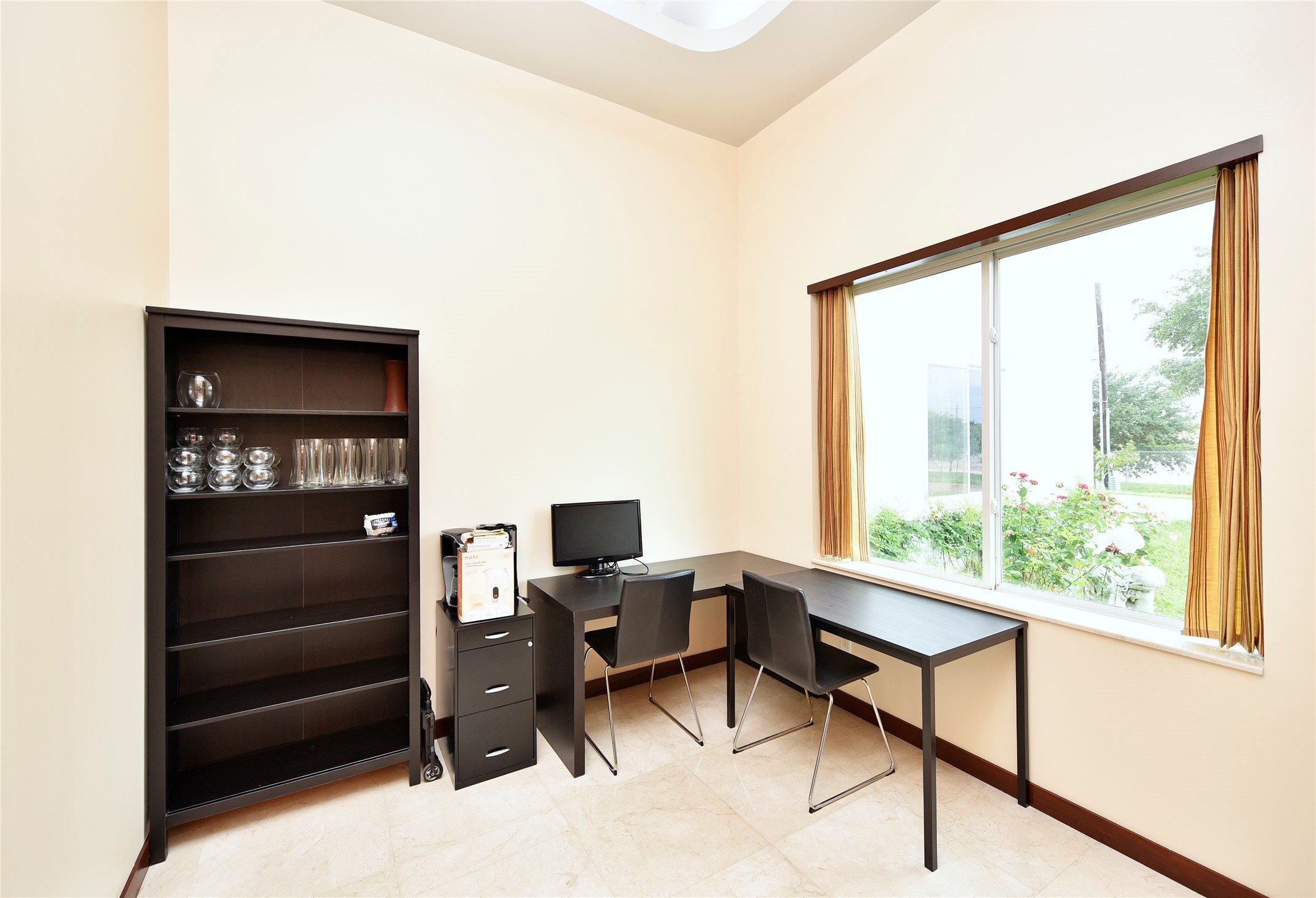 6602 Rohan Road Richmond, TX 77469 - Photo 25 of 49 a view of a livingroom with workspace and a window