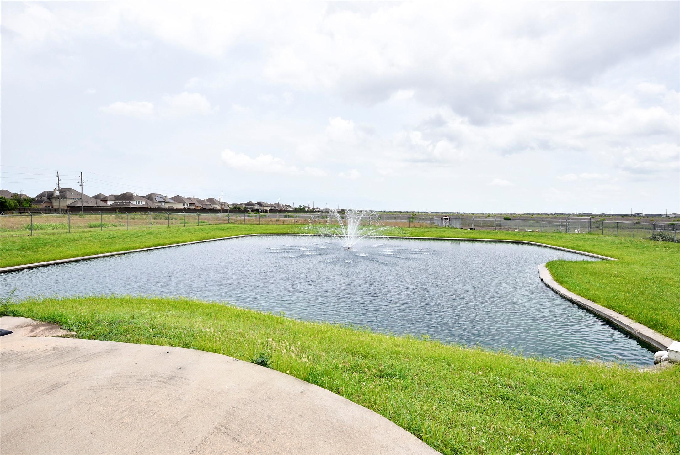 6602 Rohan Road Richmond, TX 77469 - Photo 33 of 49 a view of an outdoor space and a lake view in back