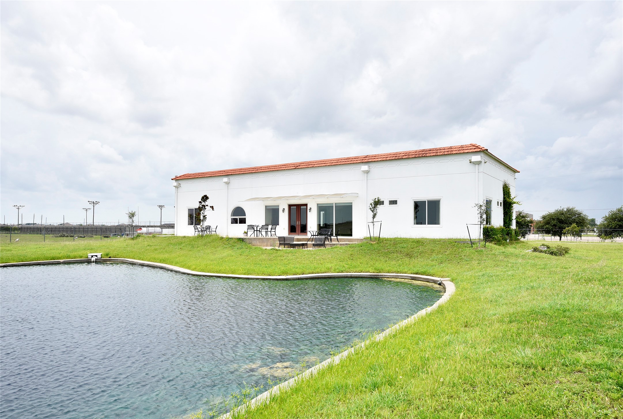 6602 Rohan Road Richmond, TX 77469 - Photo 39 of 49 a view of house with swimming pool and yard