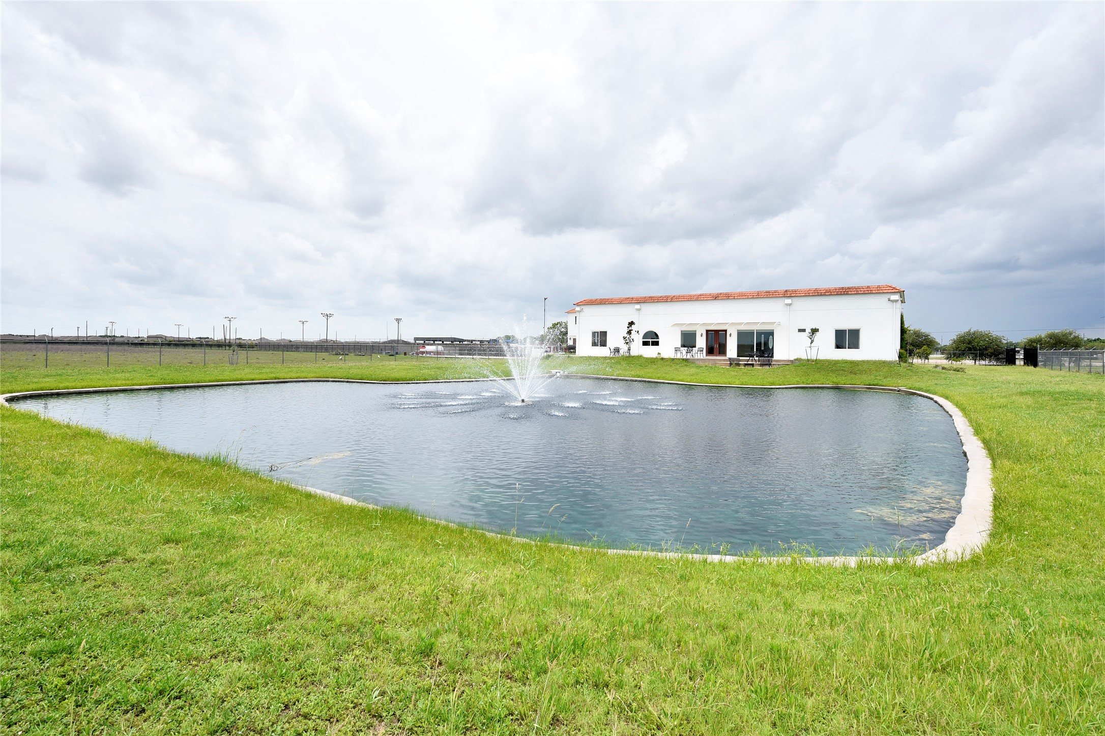 6602 Rohan Road Richmond, TX 77469 - Photo 40 of 49 a view of a swimming pool with a yard and a basket ball