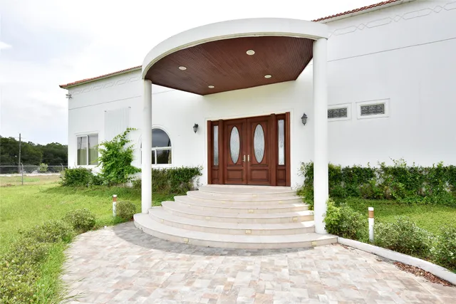 a house view with a garden space