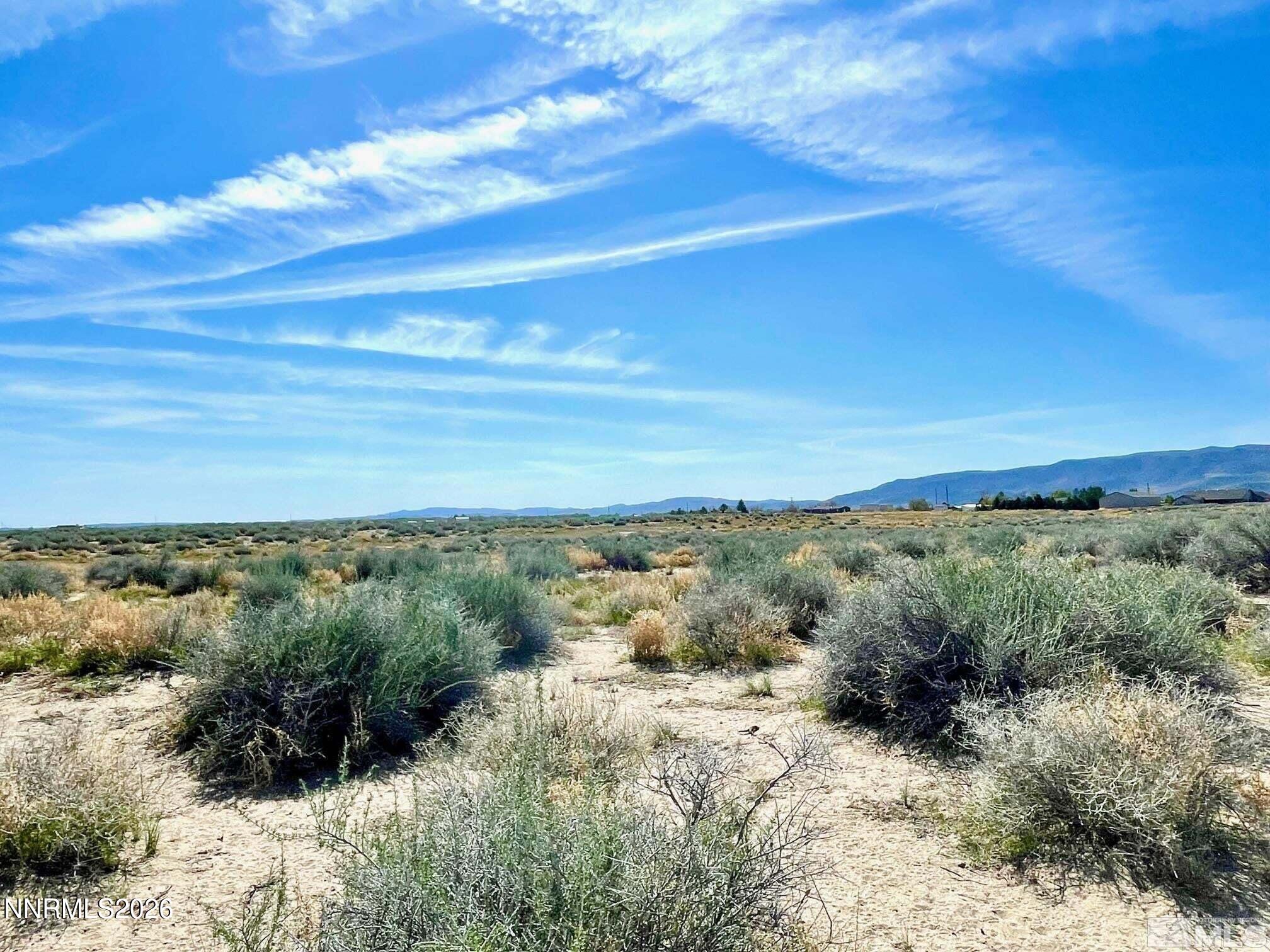 4405 7th Street Silver Springs, NV 89429 - Photo 3 of 8 a view of a city with sunset view