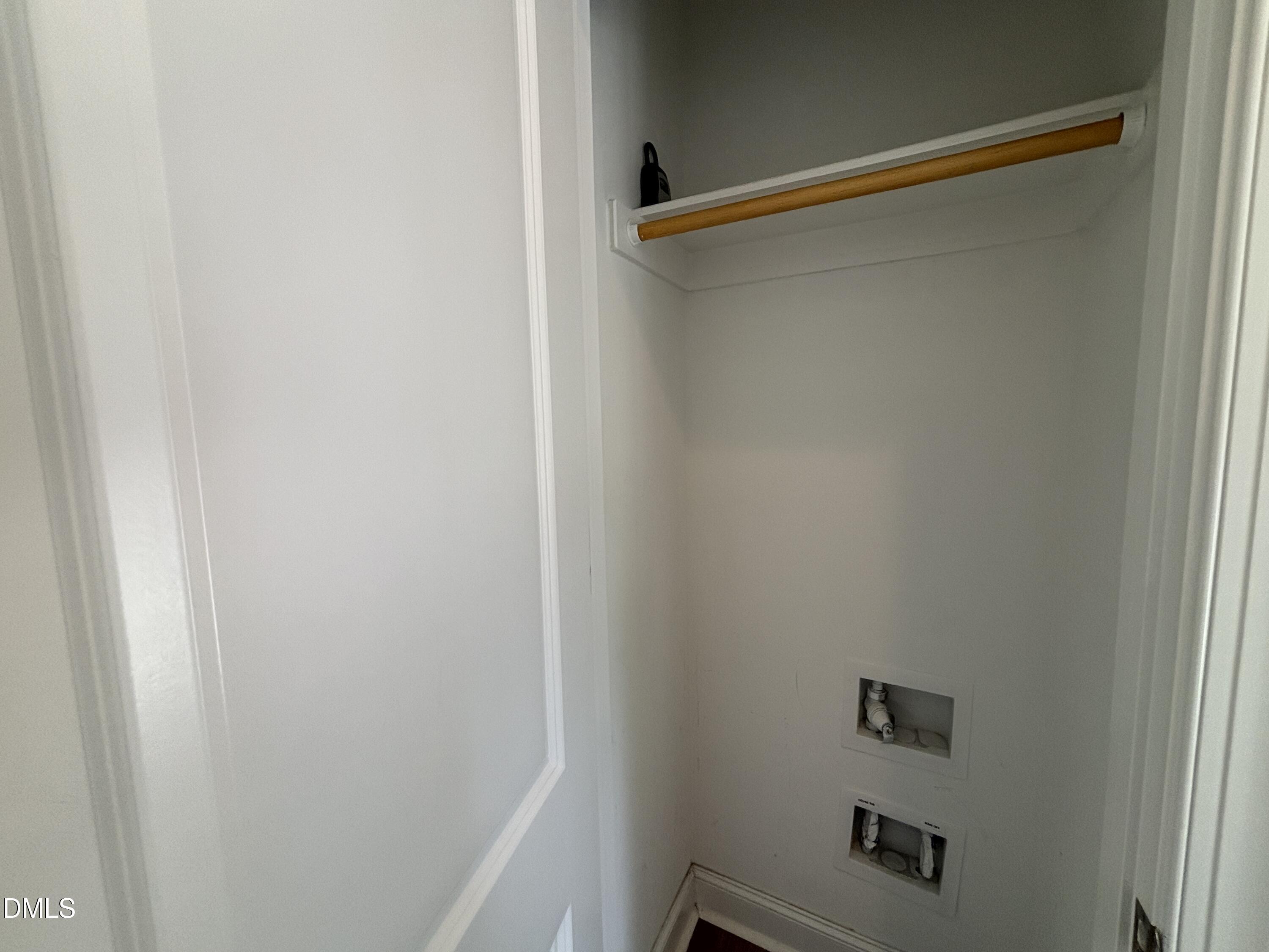 5710 Parker Pnes Court Raleigh, NC 27609 - Photo 11 of 78 a view of a room with racks on the wall