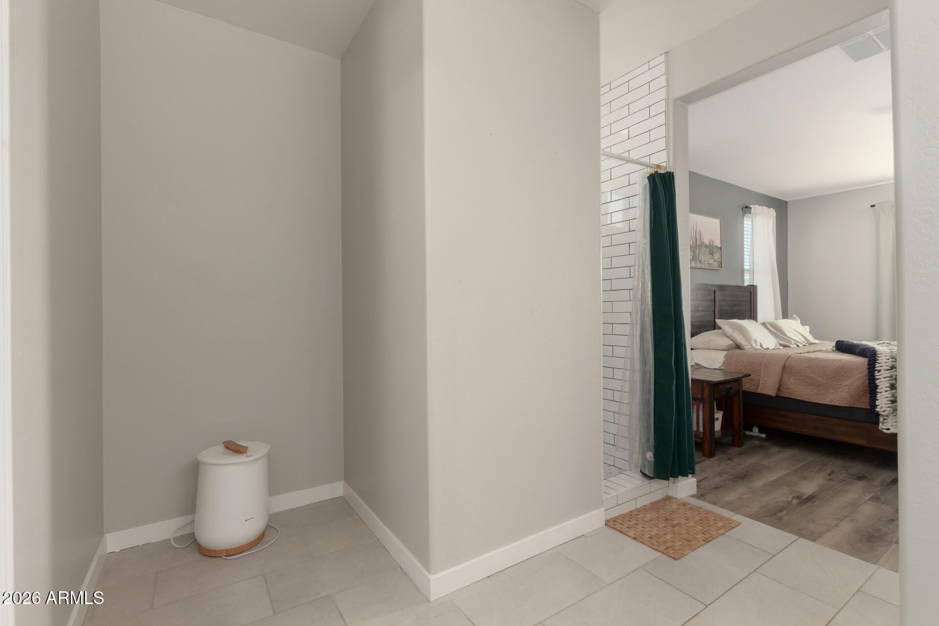 21073 West Berkeley Road Buckeye, AZ 85396 - Photo 21 of 41 a bedroom with a bed and a window