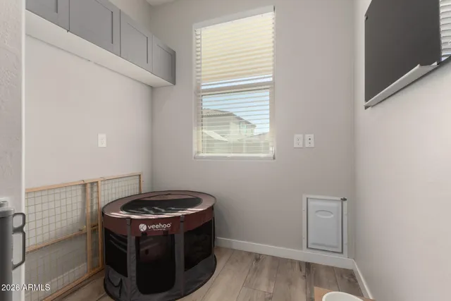 a kitchen with a stove and a window