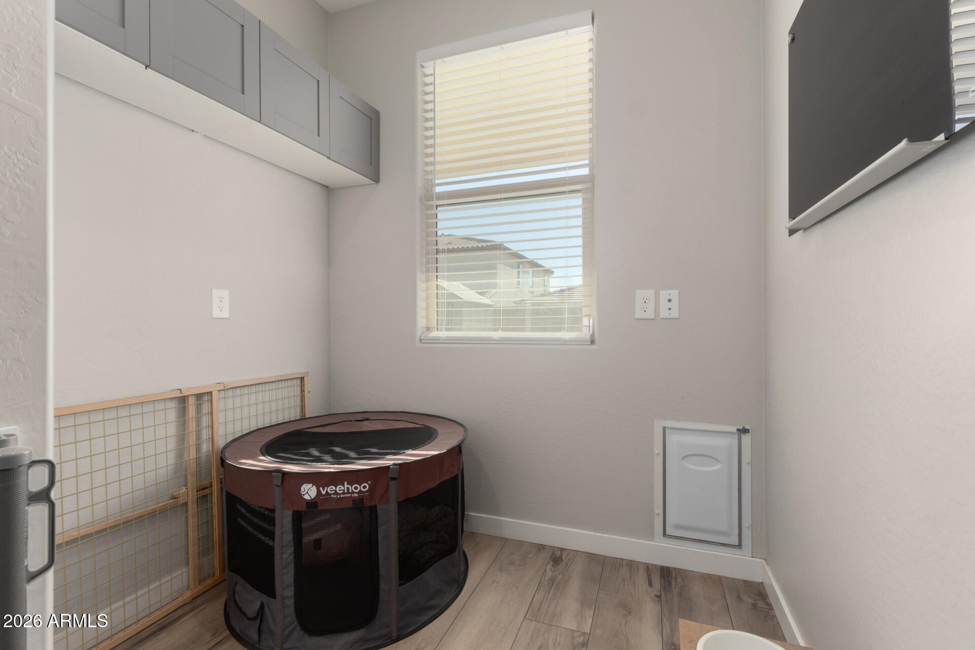 21073 West Berkeley Road Buckeye, AZ 85396 - Photo 29 of 41 a kitchen with a stove and a window