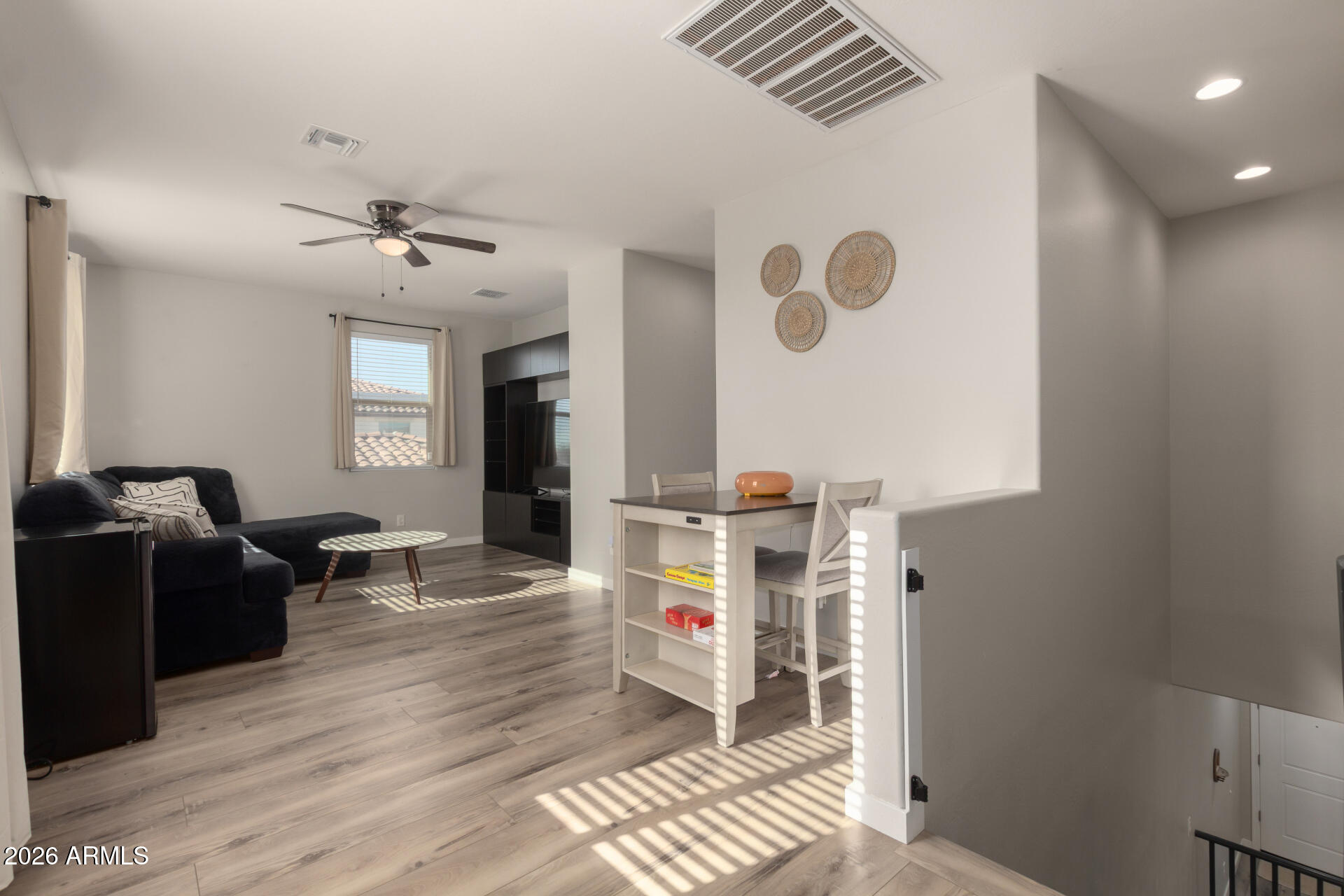 21073 West Berkeley Road Buckeye, AZ 85396 - Photo 32 of 41 a very nice looking room with a large window