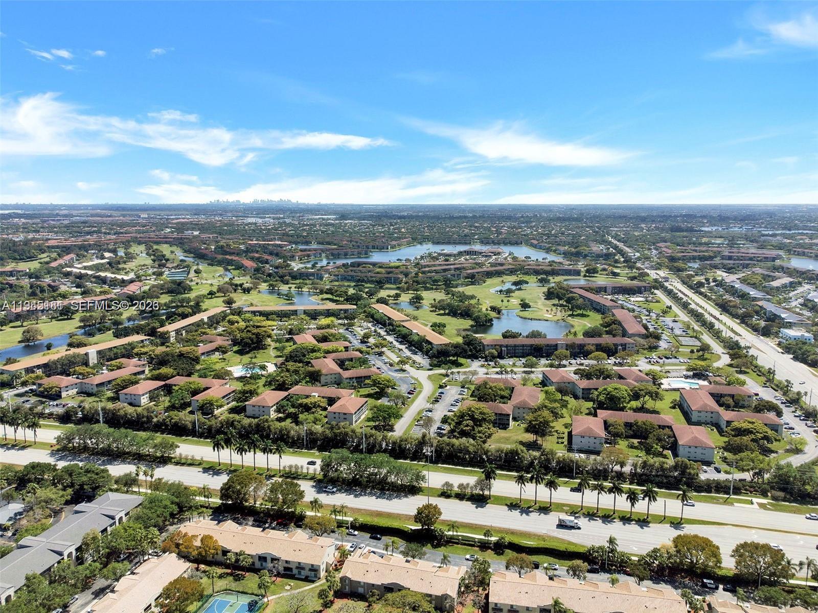 400 Southwest 134th Way, Unit 201F Pembroke Pines, FL 33027 - Photo 4 of 28 an aerial view of a city
