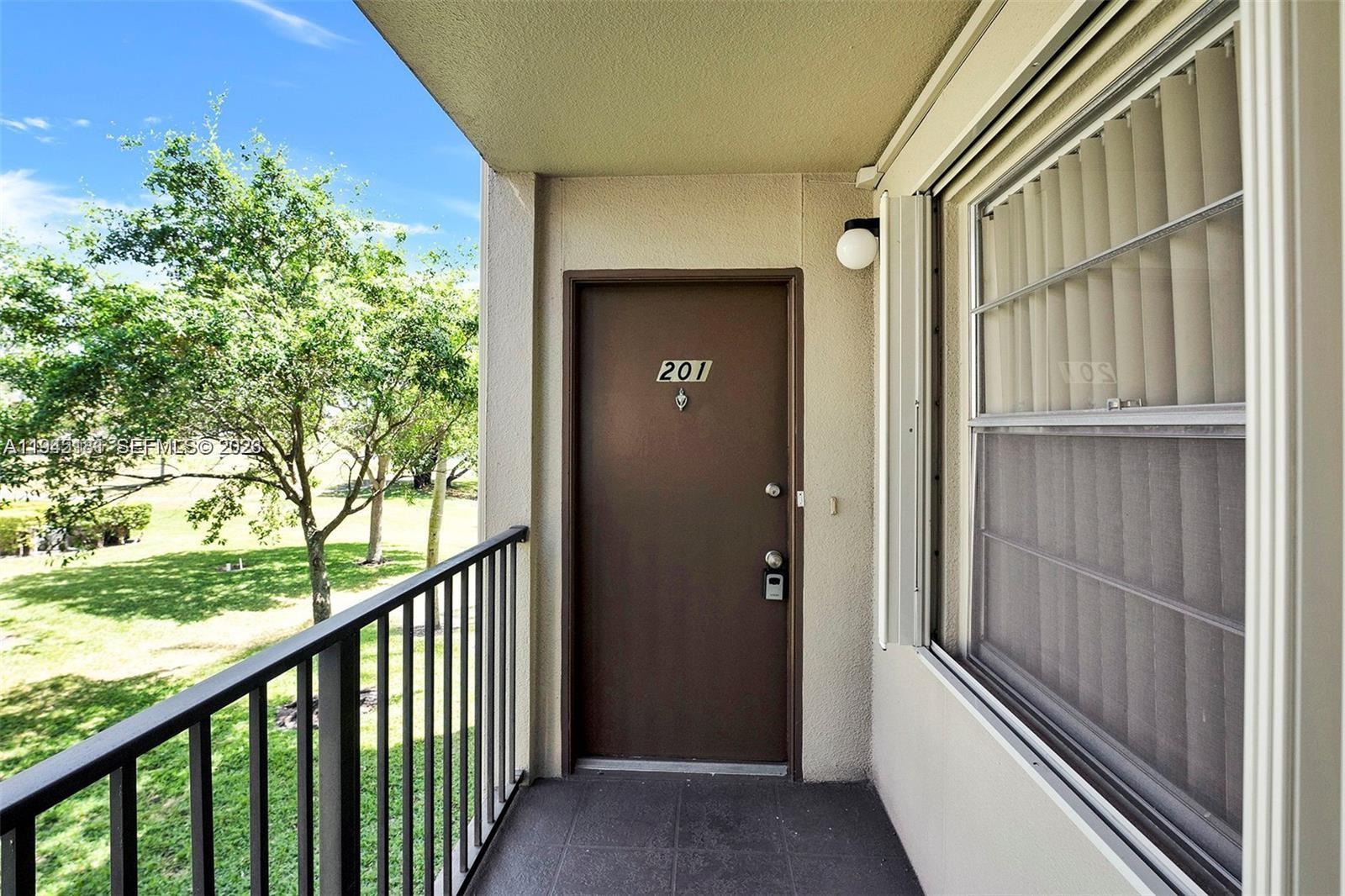 400 Southwest 134th Way, Unit 201F Pembroke Pines, FL 33027 - Photo 7 of 28 a view of a balcony